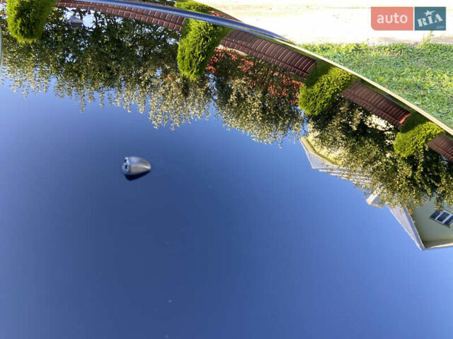 Черный Хендай Туксон, объемом двигателя 1.98 л и пробегом 197 тыс. км за 8000 $, фото 8 на Automoto.ua