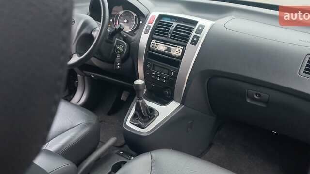 Черный Хендай Туксон, объемом двигателя 1.98 л и пробегом 155 тыс. км за 7999 $, фото 40 на Automoto.ua