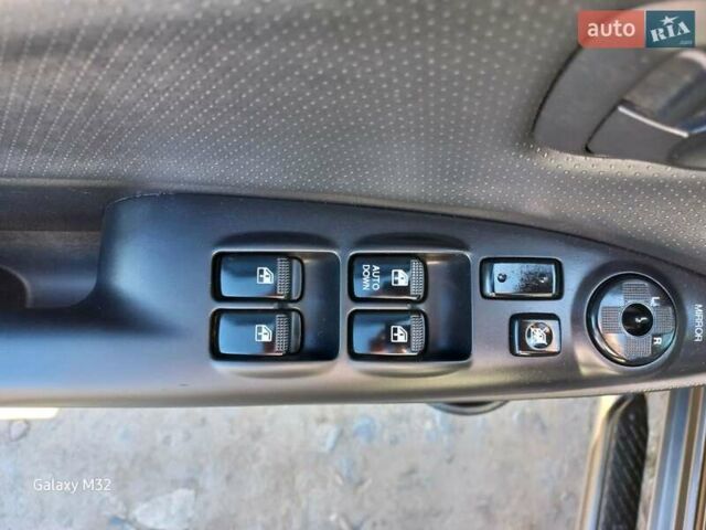 Черный Хендай Туксон, объемом двигателя 2 л и пробегом 219 тыс. км за 8500 $, фото 10 на Automoto.ua