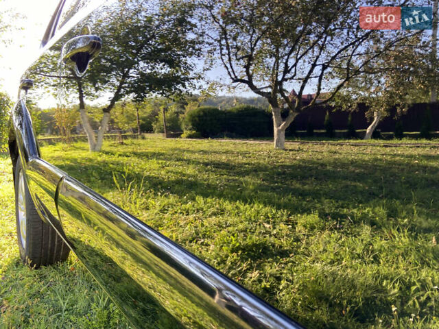 Черный Хендай Туксон, объемом двигателя 1.98 л и пробегом 197 тыс. км за 8000 $, фото 6 на Automoto.ua