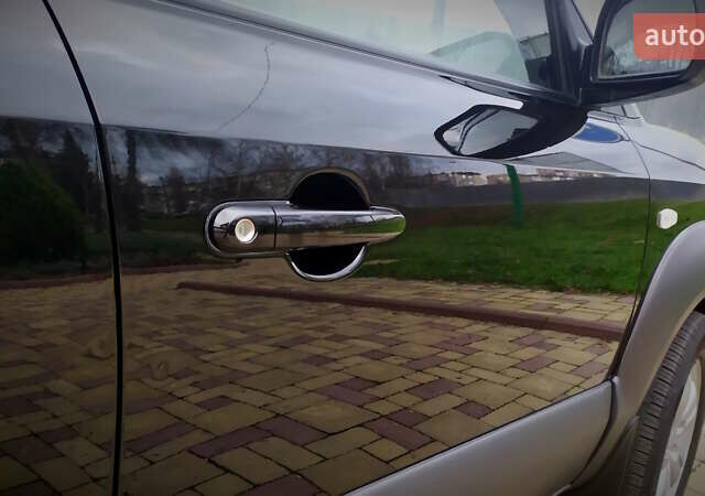 Чорний Хендай Туксон, об'ємом двигуна 2 л та пробігом 229 тис. км за 8600 $, фото 73 на Automoto.ua