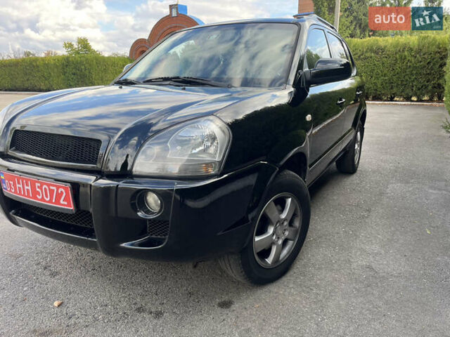 Черный Хендай Туксон, объемом двигателя 2 л и пробегом 256 тыс. км за 7800 $, фото 21 на Automoto.ua