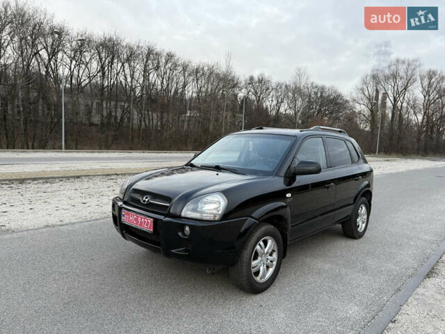 Черный Хендай Туксон, объемом двигателя 1.98 л и пробегом 159 тыс. км за 7600 $, фото 11 на Automoto.ua