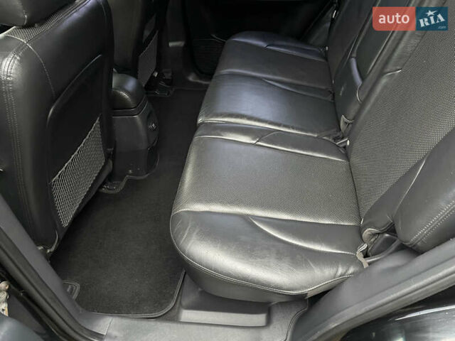 Черный Хендай Туксон, объемом двигателя 2 л и пробегом 180 тыс. км за 7700 $, фото 23 на Automoto.ua