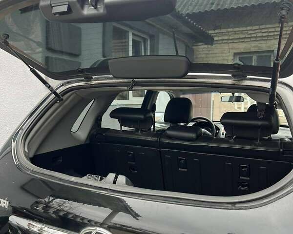 Черный Хендай Туксон, объемом двигателя 1.99 л и пробегом 302 тыс. км за 6900 $, фото 13 на Automoto.ua