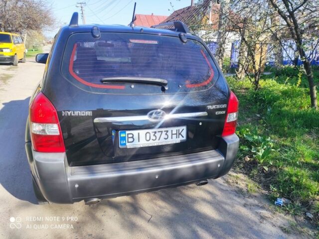 Черный Хендай Туксон, объемом двигателя 2 л и пробегом 262 тыс. км за 7800 $, фото 3 на Automoto.ua
