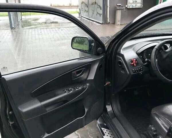 Черный Хендай Туксон, объемом двигателя 1.98 л и пробегом 193 тыс. км за 8000 $, фото 5 на Automoto.ua