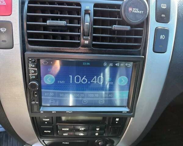 Черный Хендай Туксон, объемом двигателя 2 л и пробегом 219 тыс. км за 8500 $, фото 5 на Automoto.ua