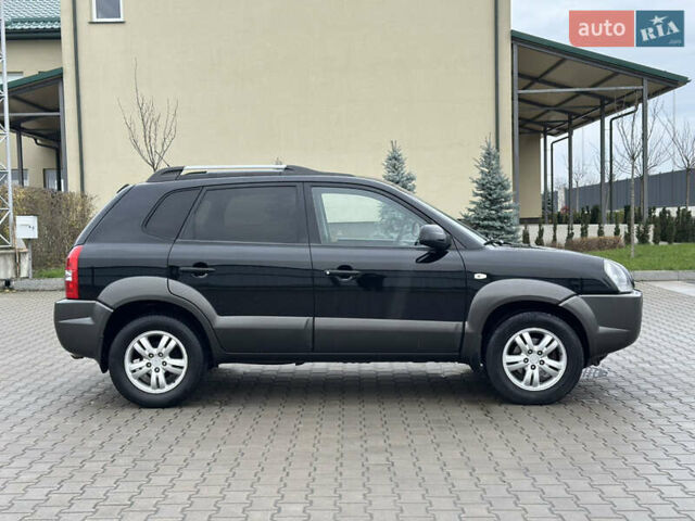 Чорний Хендай Туксон, об'ємом двигуна 2 л та пробігом 230 тис. км за 6850 $, фото 9 на Automoto.ua