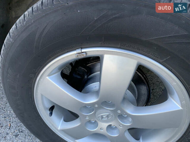 Чорний Хендай Туксон, об'ємом двигуна 2 л та пробігом 56 тис. км за 9500 $, фото 8 на Automoto.ua