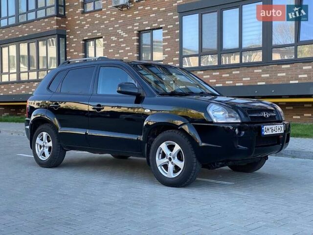 Черный Хендай Туксон, объемом двигателя 1.98 л и пробегом 286 тыс. км за 7300 $, фото 1 на Automoto.ua