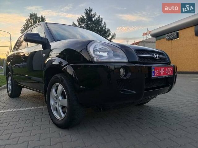 Чорний Хендай Туксон, об'ємом двигуна 1.98 л та пробігом 192 тис. км за 7950 $, фото 6 на Automoto.ua