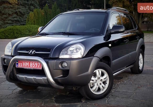 Черный Хендай Туксон, объемом двигателя 2 л и пробегом 230 тыс. км за 8600 $, фото 87 на Automoto.ua