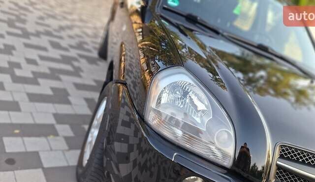 Черный Хендай Туксон, объемом двигателя 2 л и пробегом 190 тыс. км за 8150 $, фото 16 на Automoto.ua