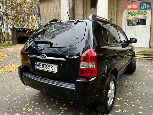 Черный Хендай Туксон, объемом двигателя 1.98 л и пробегом 99 тыс. км за 8999 $, фото 4 на Automoto.ua