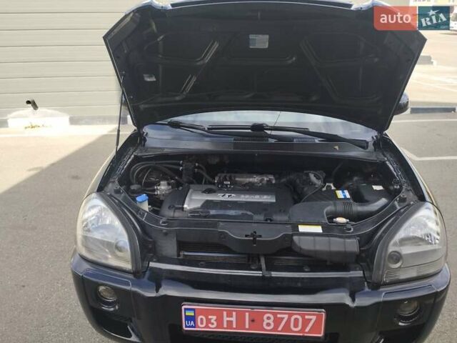 Чорний Хендай Туксон, об'ємом двигуна 1.98 л та пробігом 203 тис. км за 8500 $, фото 19 на Automoto.ua