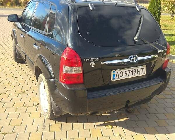 Черный Хендай Туксон, объемом двигателя 2 л и пробегом 277 тыс. км за 7900 $, фото 5 на Automoto.ua