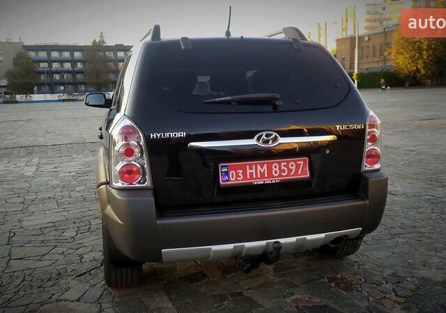 Черный Хендай Туксон, объемом двигателя 2 л и пробегом 230 тыс. км за 8600 $, фото 16 на Automoto.ua