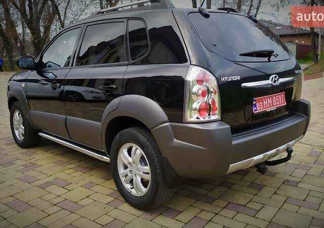 Чорний Хендай Туксон, об'ємом двигуна 2 л та пробігом 229 тис. км за 8600 $, фото 33 на Automoto.ua