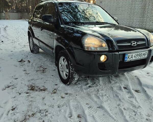 Черный Хендай Туксон, объемом двигателя 1.98 л и пробегом 335 тыс. км за 7800 $, фото 14 на Automoto.ua