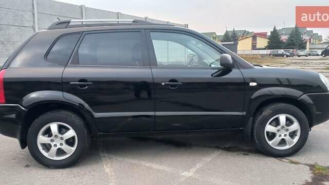 Черный Хендай Туксон, объемом двигателя 1.98 л и пробегом 155 тыс. км за 7999 $, фото 7 на Automoto.ua