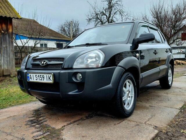 Черный Хендай Туксон, объемом двигателя 2 л и пробегом 272 тыс. км за 7500 $, фото 13 на Automoto.ua