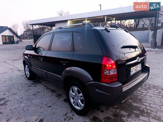 Черный Хендай Туксон, объемом двигателя 2 л и пробегом 280 тыс. км за 9500 $, фото 25 на Automoto.ua