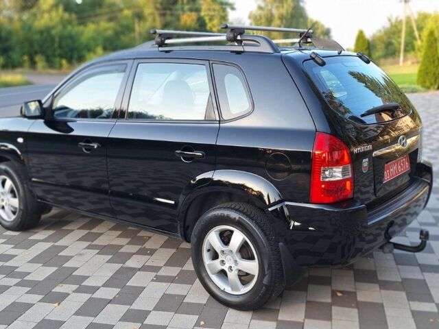 Чорний Хендай Туксон, об'ємом двигуна 2 л та пробігом 190 тис. км за 8300 $, фото 9 на Automoto.ua