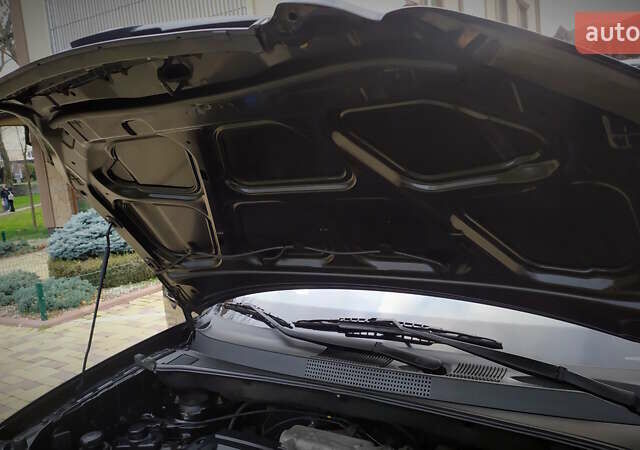 Чорний Хендай Туксон, об'ємом двигуна 2 л та пробігом 229 тис. км за 8600 $, фото 146 на Automoto.ua