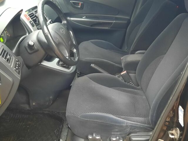 Чорний Хендай Туксон, об'ємом двигуна 2 л та пробігом 214 тис. км за 4400 $, фото 4 на Automoto.ua