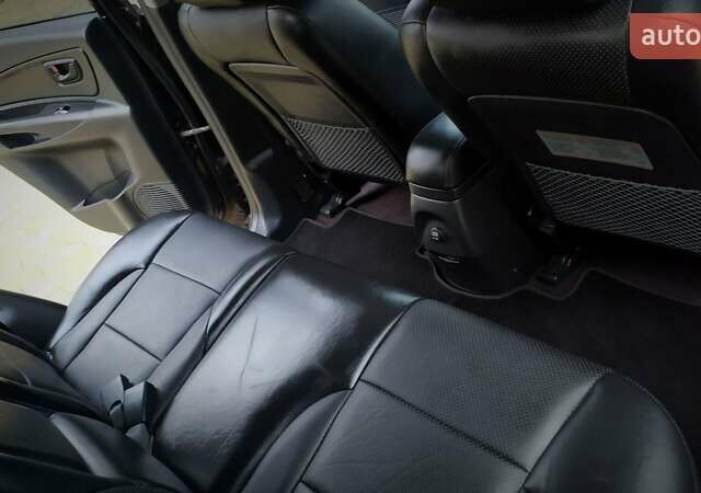 Чорний Хендай Туксон, об'ємом двигуна 2 л та пробігом 229 тис. км за 8600 $, фото 137 на Automoto.ua