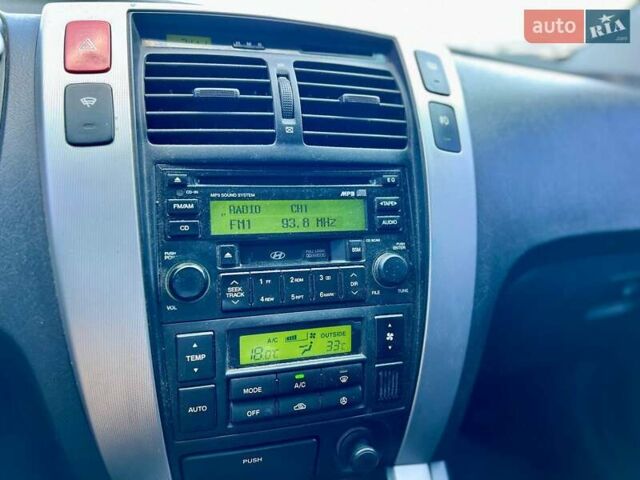 Черный Хендай Туксон, объемом двигателя 2 л и пробегом 227 тыс. км за 8200 $, фото 20 на Automoto.ua