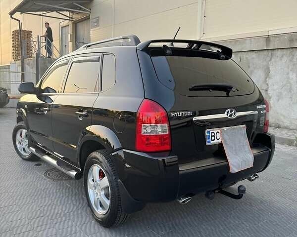 Черный Хендай Туксон, объемом двигателя 1.99 л и пробегом 231 тыс. км за 8500 $, фото 10 на Automoto.ua