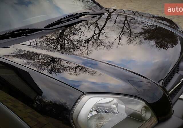 Чорний Хендай Туксон, об'ємом двигуна 2 л та пробігом 229 тис. км за 8600 $, фото 61 на Automoto.ua