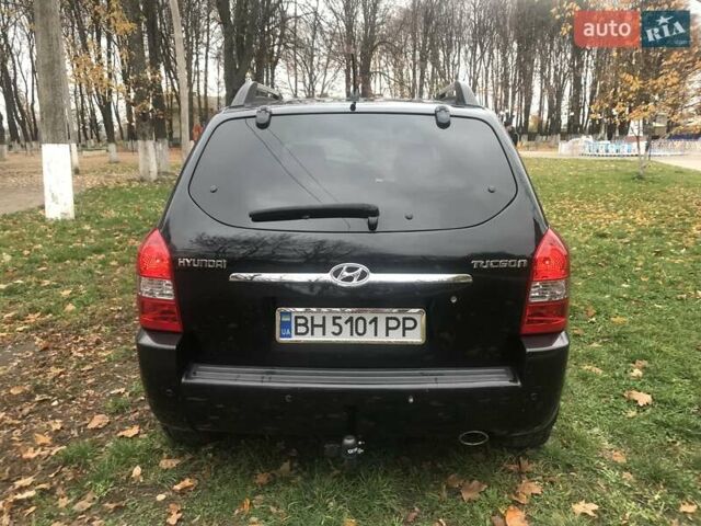Черный Хендай Туксон, объемом двигателя 2 л и пробегом 210 тыс. км за 8999 $, фото 24 на Automoto.ua