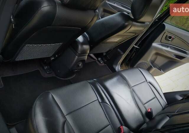 Чорний Хендай Туксон, об'ємом двигуна 2 л та пробігом 229 тис. км за 8600 $, фото 134 на Automoto.ua