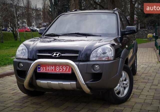 Чорний Хендай Туксон, об'ємом двигуна 2 л та пробігом 229 тис. км за 8600 $, фото 5 на Automoto.ua