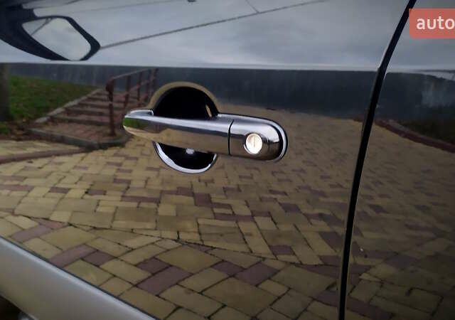 Чорний Хендай Туксон, об'ємом двигуна 2 л та пробігом 229 тис. км за 8600 $, фото 89 на Automoto.ua