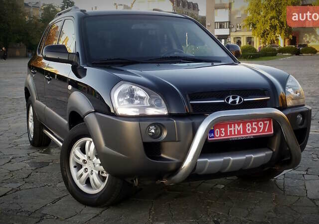 Черный Хендай Туксон, объемом двигателя 2 л и пробегом 230 тыс. км за 8600 $, фото 25 на Automoto.ua