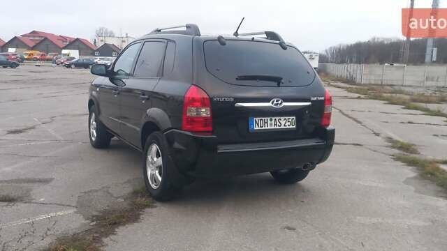 Черный Хендай Туксон, объемом двигателя 1.98 л и пробегом 155 тыс. км за 7999 $, фото 9 на Automoto.ua