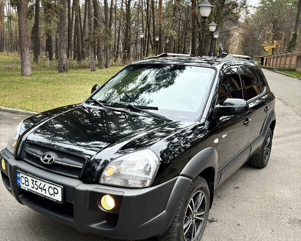 Черный Хендай Туксон, объемом двигателя 1.99 л и пробегом 266 тыс. км за 7500 $, фото 11 на Automoto.ua