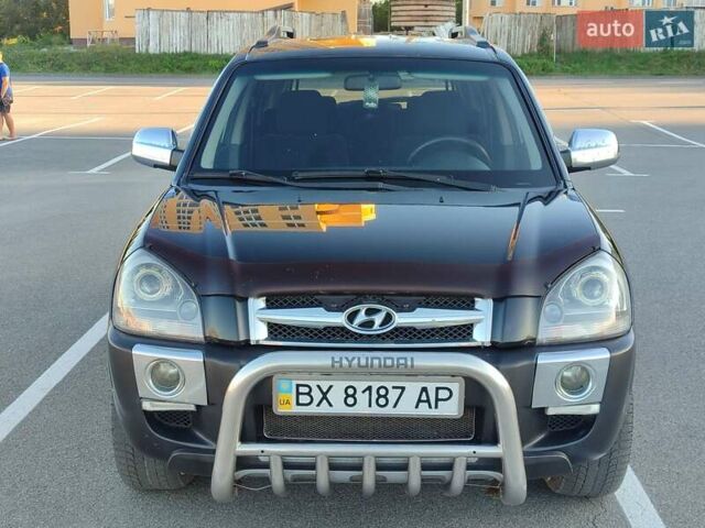 Черный Хендай Туксон, объемом двигателя 2 л и пробегом 280 тыс. км за 6700 $, фото 1 на Automoto.ua