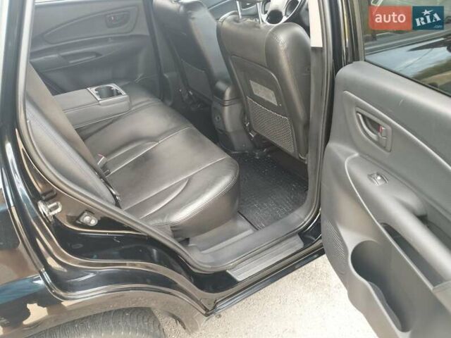 Чорний Хендай Туксон, об'ємом двигуна 1.98 л та пробігом 203 тис. км за 8500 $, фото 9 на Automoto.ua
