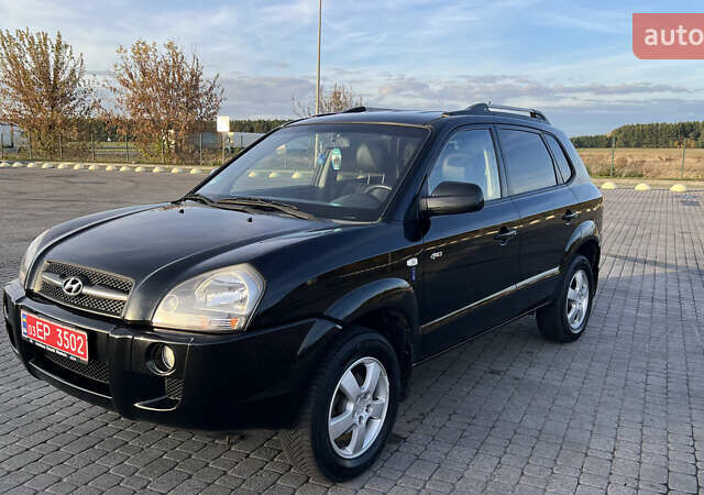 Черный Хендай Туксон, объемом двигателя 1.98 л и пробегом 243 тыс. км за 8500 $, фото 12 на Automoto.ua
