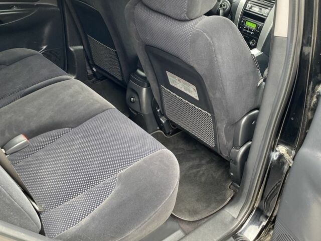 Черный Хендай Туксон, объемом двигателя 2 л и пробегом 330 тыс. км за 4350 $, фото 21 на Automoto.ua