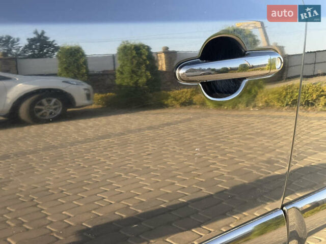 Черный Хендай Туксон, объемом двигателя 2 л и пробегом 270 тыс. км за 8200 $, фото 6 на Automoto.ua
