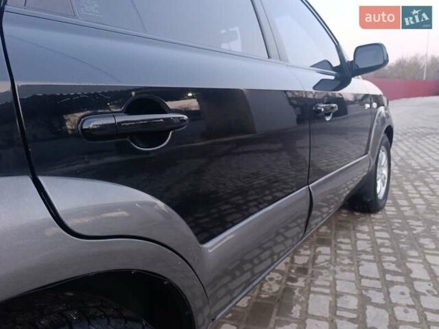 Черный Хендай Туксон, объемом двигателя 2 л и пробегом 280 тыс. км за 9500 $, фото 11 на Automoto.ua