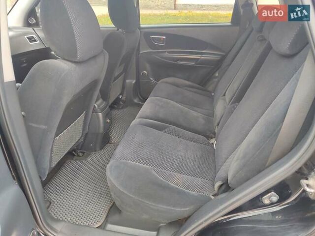 Черный Хендай Туксон, объемом двигателя 2 л и пробегом 270 тыс. км за 6800 $, фото 14 на Automoto.ua