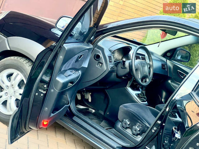 Чорний Хендай Туксон, об'ємом двигуна 1.98 л та пробігом 164 тис. км за 7950 $, фото 5 на Automoto.ua