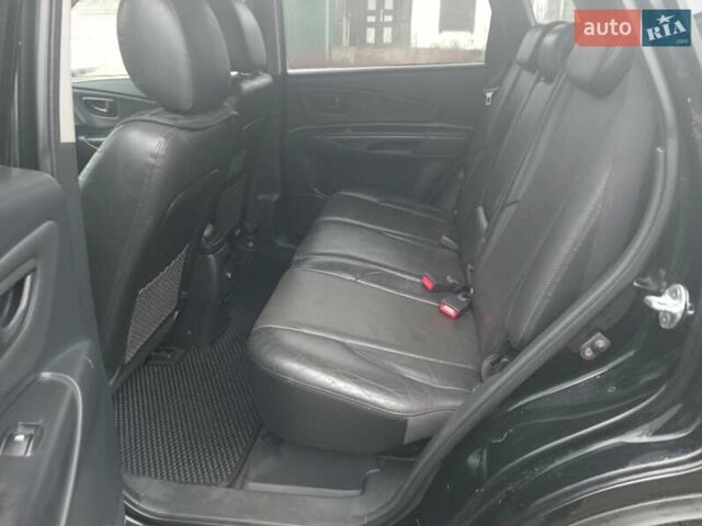 Черный Хендай Туксон, объемом двигателя 1.99 л и пробегом 235 тыс. км за 9000 $, фото 10 на Automoto.ua